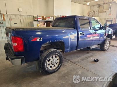 Trzecie zdjęcie samochodu z tyłu: 2013 CHEVROLET SILVERADO K2500 HEAVY DUTY LT VIN:1GC1KXC88DF216268 - miniatura