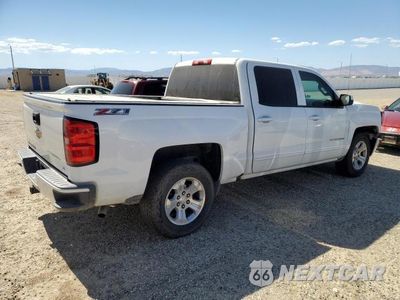 Trzecie zdjęcie samochodu z tyłu: 2017 CHEVROLET SILVERADO LT VIN:3GCUKREC4HG213107 - miniatura