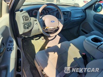 Zdjęcie 8 z 12 samochodu: 2003 FORD F150 VIN:1FTRX17263NA77270 - miniatura
