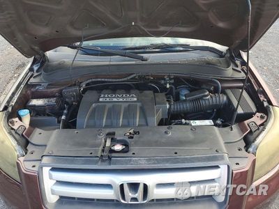 Zdjęcie 12 z 13 samochodu: 2007 HONDA PILOT EXL VIN:2HKYF18697H537754 - miniatura