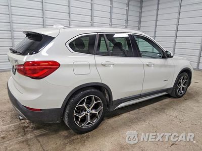 Trzecie zdjęcie samochodu z tyłu: 2016 BMW X1 XDRIVE28I VIN:WBXHT3C38GP887241 - miniatura