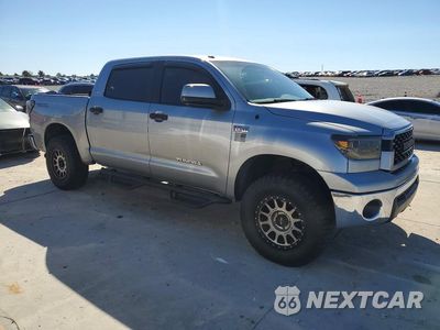 Czwarte zdjęcie samochodu z boku: 2012 TOYOTA TUNDRA CREWMAX SR5 VIN:5TFDY5F14CX231793 - miniatura