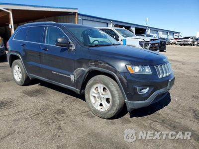 Czwarte zdjęcie samochodu z boku: 2014 JEEP GRAND CHEROKEE LAREDO VIN:1C4RJFAG4EC129576 - miniatura