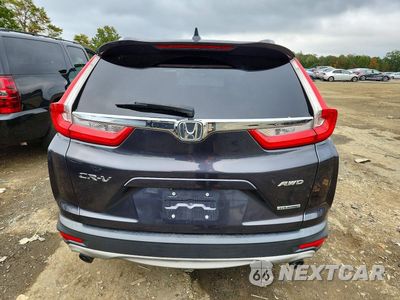Zdjęcie 6 z 13 samochodu: 2017 HONDA CR-V TOURING VIN:2HKRW2H98HH613941 - miniatura