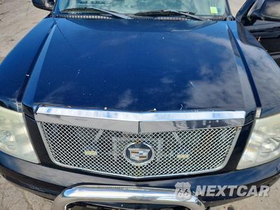 Zdjęcie 11 z 12 samochodu: 2003 CADILLAC ESCALADE EXT VIN:3GYEK63NX3G291739 - miniatura