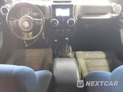 Zdjęcie 8 z 13 samochodu: 2012 JEEP WRANGLER UNLIMITED SAHARA VIN:1C4BJWEG5CL276093 - miniatura