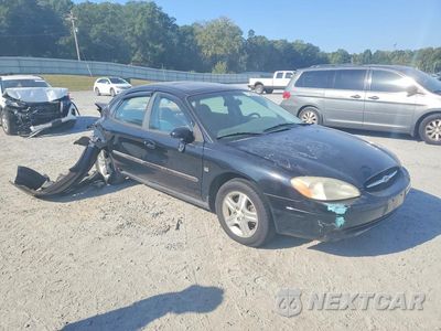 Czwarte zdjęcie samochodu z boku: 2001 FORD TAURUS SEL VIN:1FAHP56S41A177253 - miniatura