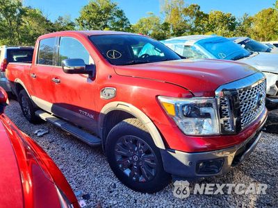 Czwarte zdjęcie samochodu z boku: 2017 NISSAN TITAN PLATINUM RESERVE VIN:1N6AA1E51HN565820 - miniatura