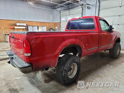 Trzecie zdjęcie samochodu z tyłu: 1999 FORD F250 SUPER DUTY VIN:1FTNF21F7XEA53875 - miniatura