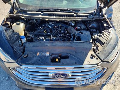 Zdjęcie 12 z 13 samochodu: 2022 FORD EDGE TITANIUM VIN:2FMPK4K90NBA54721 - miniatura