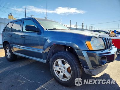 Czwarte zdjęcie samochodu z boku: 2007 JEEP GRAND CHEROKEE LAREDO VIN:1J8GS48K07C597755 - miniatura