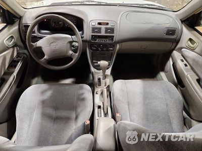 Zdjęcie 8 z 12 samochodu: 1999 TOYOTA COROLLA VE VIN:1NXBR12E1XZ214412 - miniatura