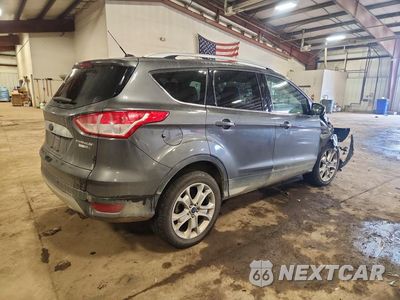 Trzecie zdjęcie samochodu z tyłu: 2015 FORD ESCAPE TITANIUM VIN:1FMCU9J95FUC04650 - miniatura