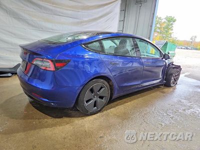 Trzecie zdjęcie samochodu z tyłu: 2022 TESLA MODEL 3 VIN:5YJ3E1EA7NF371851 - miniatura