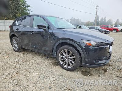 Czwarte zdjęcie samochodu z boku: 2020 MAZDA CX-5 GRAND TOURING VIN:JM3KFBDM5L0856759 - miniatura