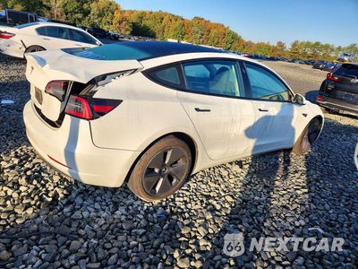 Trzecie zdjęcie samochodu z tyłu: 2023 TESLA MODEL 3 VIN:5YJ3E1EAXPF396214 - miniatura