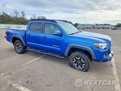 Czwarte zdjęcie samochodu z boku: 2017 TOYOTA TACOMA TRD OFF-ROAD VIN:3TMCZ5AN4HM063797 - miniatura