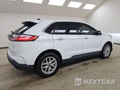 Trzecie zdjęcie samochodu z tyłu: 2021 FORD EDGE SEL VIN:2FMPK4J94MBA01939 - miniatura