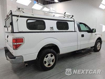 Trzecie zdjęcie samochodu z tyłu: 2014 FORD F150 VIN:1FTMF1CM5EKD18020 - miniatura