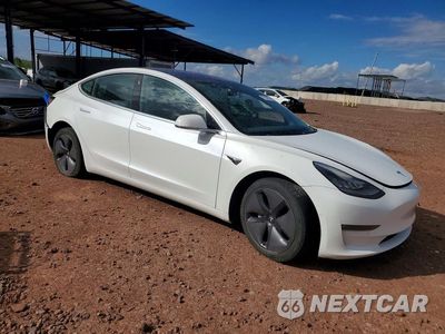 Czwarte zdjęcie samochodu z boku: 2020 TESLA MODEL 3 VIN:5YJ3E1EC1LF602502 - miniatura