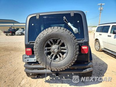 Zdjęcie 6 z 12 samochodu: 2004 JEEP WRANGLER / TJ SAHARA VIN:1J4FA59SX4P722575 - miniatura