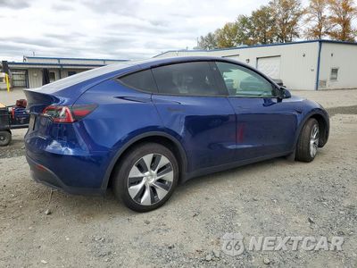 Trzecie zdjęcie samochodu z tyłu: 2022 TESLA MODEL Y VIN:7SAYGAEE9NF506401 - miniatura