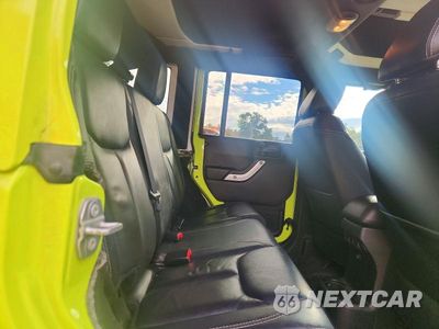 Zdjęcie 10 z 12 samochodu: 2017 JEEP WRANGLER UNLIMITED SAHARA VIN:1C4HJWEGXHL507989 - miniatura