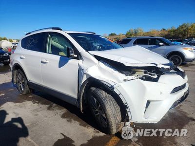 Czwarte zdjęcie samochodu z boku: 2016 TOYOTA RAV4 HV XLE VIN:JTMRJREV7GD026384 - miniatura