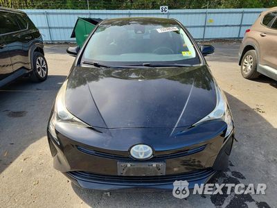 Piąte zdjęcie samochodu w środku: 2017 TOYOTA PRIUS TWO VIN:JTDKBRFUXH3029503 - miniatura