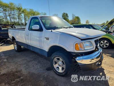 Czwarte zdjęcie samochodu z boku: 2003 FORD F150 VIN:2FTRF18W13CA05452 - miniatura