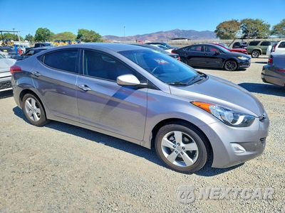 Czwarte zdjęcie samochodu z boku: 2012 HYUNDAI ELANTRA GLS VIN:KMHDH4AE3CU357533 - miniatura
