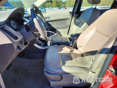 Zdjęcie 7 z 12 samochodu: 2010 FORD FOCUS SEL VIN:1FAHP3HN2AW156626 - miniatura