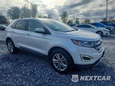 Czwarte zdjęcie samochodu z boku: 2015 FORD EDGE SEL VIN:2FMTK4J94FBB07633 - miniatura