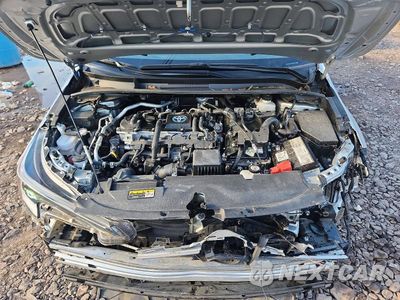 Zdjęcie 11 z 13 samochodu: 2023 TOYOTA COROLLA HYBRID LE VIN:JTDBDMHE2PJ003815 - miniatura