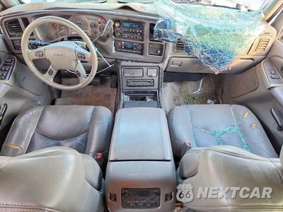 Zdjęcie 8 z 12 samochodu: 2003 GMC YUKON DENALI VIN:1GKEK63UX3J316171 - miniatura