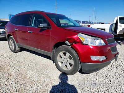 Czwarte zdjęcie samochodu z boku: 2011 CHEVROLET TRAVERSE LT VIN:1GNKRJED7BJ177990 - miniatura