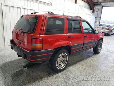 Trzecie zdjęcie samochodu z tyłu: 1998 JEEP GRAND CHEROKEE LAREDO VIN:1J4GZ58S3WC188859 - miniatura