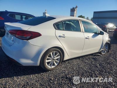 Trzecie zdjęcie samochodu z tyłu: 2017 KIA FORTE S VIN:3KPFL4A74HE026592 - miniatura