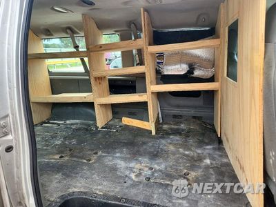 Zdjęcie 11 z 13 samochodu: 2010 FORD E350 ECONO VIN:1FBNE3BL5ADA30819 - miniatura
