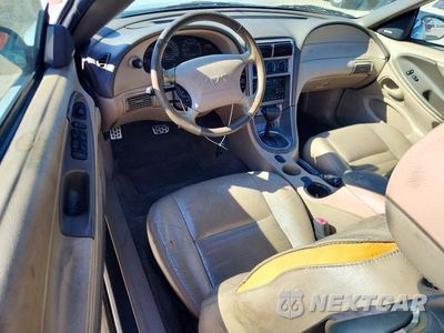 Zdjęcie 8 z 13 samochodu: 2004 FORD MUSTANG GT VIN:1FAFP45X84F241638 - miniatura
