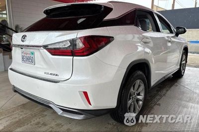 Czwarte zdjęcie samochodu z boku: 2018 LEXUS RX 450H BASE VIN:2T2BGMCA6JC025908 - miniatura
