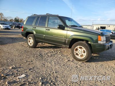 Czwarte zdjęcie samochodu z boku: 1997 JEEP GRAND CHEROKEE LIMITED VIN:1J4GZ78YXVC563693 - miniatura