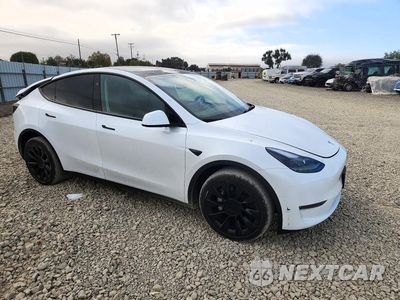 Czwarte zdjęcie samochodu z boku: 2024 TESLA MODEL Y VIN:7SAYGDEE9RA259854 - miniatura