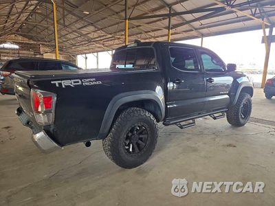Trzecie zdjęcie samochodu z tyłu: 2020 TOYOTA TACOMA TRD OFF-ROAD VIN:3TMAZ5CN8LM138434 - miniatura
