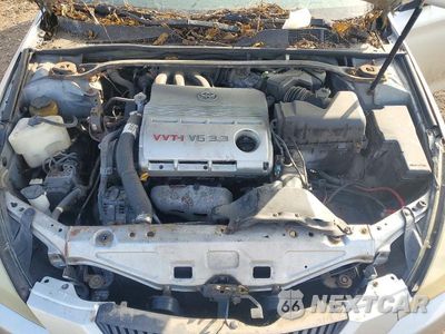 Zdjęcie 11 z 12 samochodu: 2006 TOYOTA CAMRY SOLARA SLE V6 VIN:4T1FA38P16U070887 - miniatura