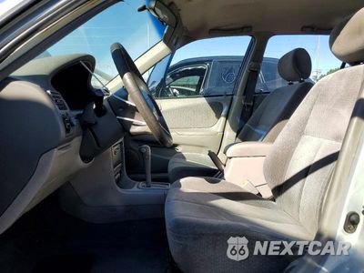 Zdjęcie 7 z 12 samochodu: 2002 TOYOTA COROLLA LE VIN:1NXBR12E62Z607024 - miniatura
