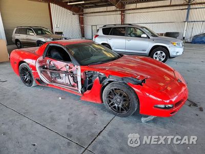 Czwarte zdjęcie samochodu z boku: 2003 CHEVROLET CORVETTE Z06 VIN:1G1YY12S735107837 - miniatura