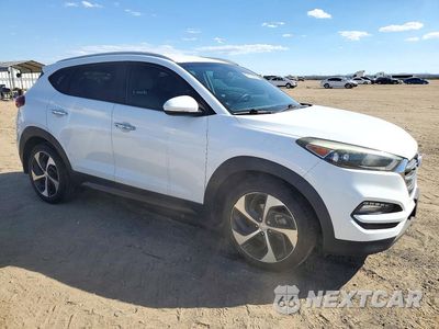 Czwarte zdjęcie samochodu z boku: 2016 HYUNDAI TUCSON LIMITED VIN:KM8J33A27GU119885 - miniatura