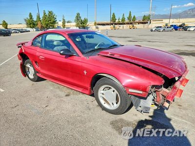 Czwarte zdjęcie samochodu z boku: 1997 FORD MUSTANG VIN:1FALP4043VF122283 - miniatura