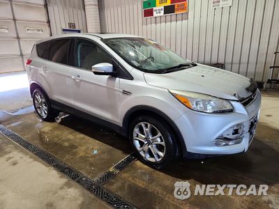Czwarte zdjęcie samochodu z boku: 2013 FORD ESCAPE SEL VIN:1FMCU9H94DUD87039 - miniatura